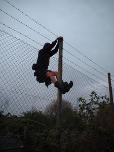 bristol avon street kate rich barbed wire fence climbing