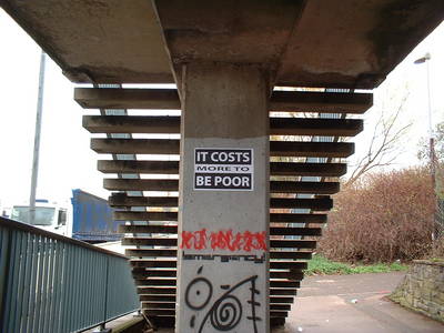 fly poster graffiti it costs more to be poor m bridge st werburghs