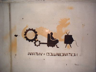 apathy equals collaboration dragon television arm chair cogs stencil graffiti