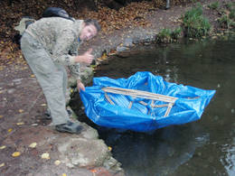 coracle launchin in to water