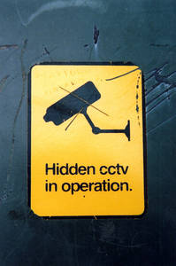 vandalised sticker graffiti street art hidden cctv in operation banff centre canada